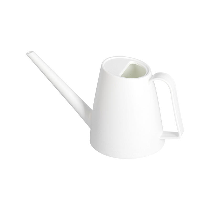 White plastic watering can with handle
